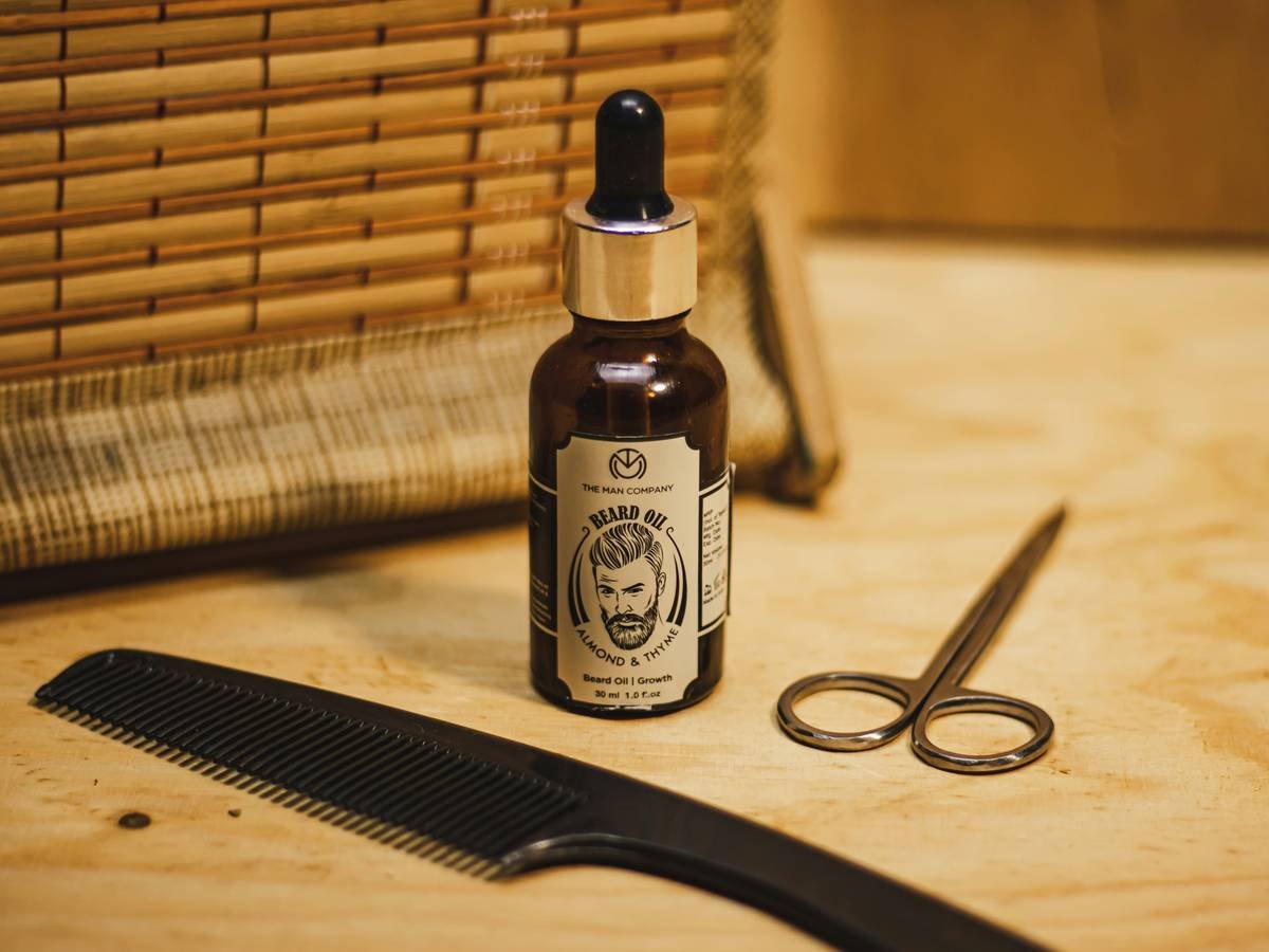 Comparison of grooming essentials beard balm and wax application results on coarse facial hair